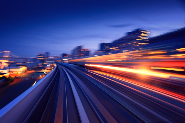 Light Trails On Road In City At Night