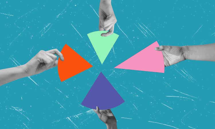 Diversified investment strategy. Hands hold the charts. The investor manages the portfolio. Pie chart, division.