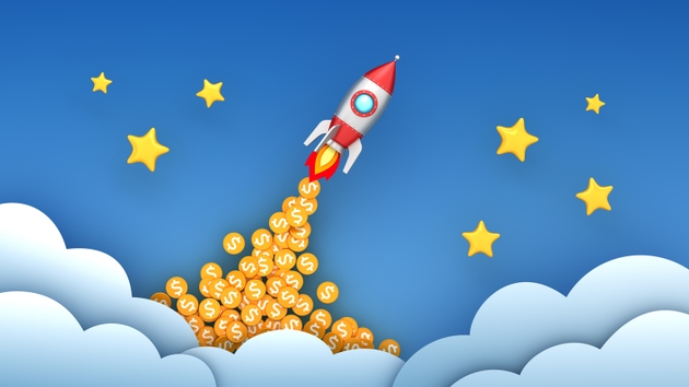 Space rocket and coins with dollar sign on blue sky background. Lucky business startup and good trading. Successful takeoff. To the moon concept.