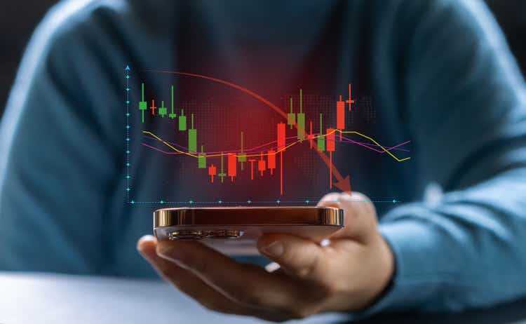 Dramatic stock market crash, red downward arrows and declining financial charts superimposed business Trading, economic downturns and market volatility, money, investment advisories, market risks