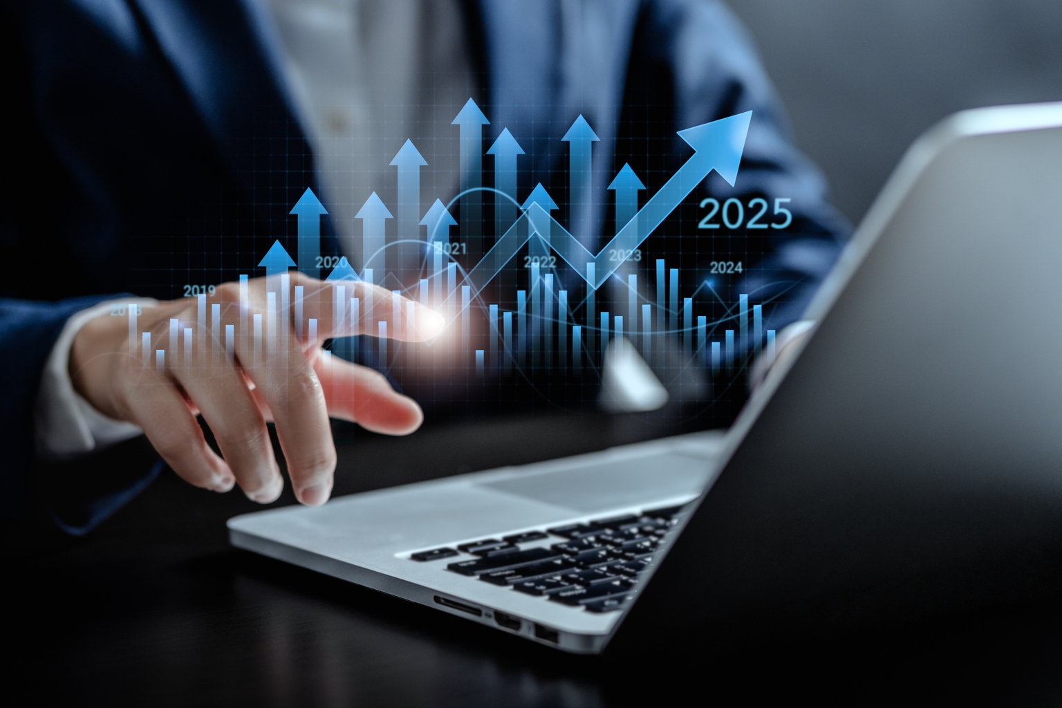 Businesswomen pointing to arrow up virtual to forecast and analyze the stock market and economic with virtual chart, trend upside business market growth, investments and financial concept.