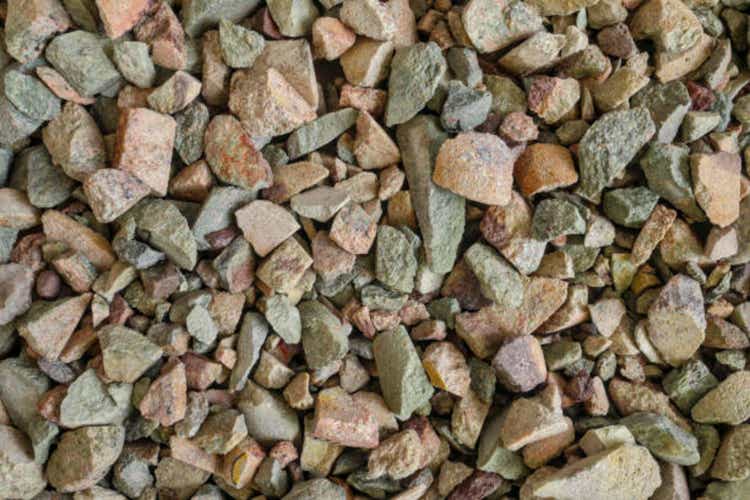 Rare earth (earths) element ore. Critical minerals, used in production of permanent magnets, aerospace alloys, specialty glass, electronic equipment, electric motors of hybrid and electric vehicles (EV), wind turbine generators. Background concept.