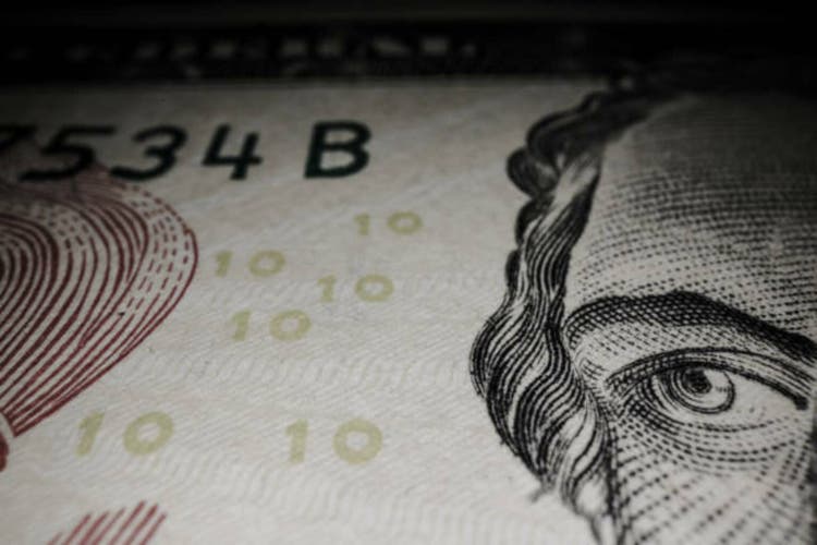Extreme close-ups (macro shots) of details of US Currency Dollar notes. Madison worried looking eye.