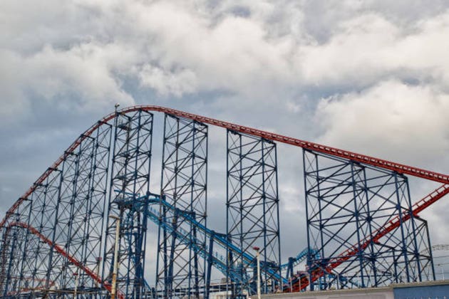 Towering Roller Coaster Against Cloudy Sky in Blackpool, UK