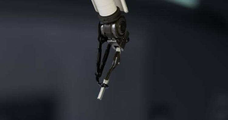Zoomed in on the robotic arm, emphasizing its slim metal end-effector