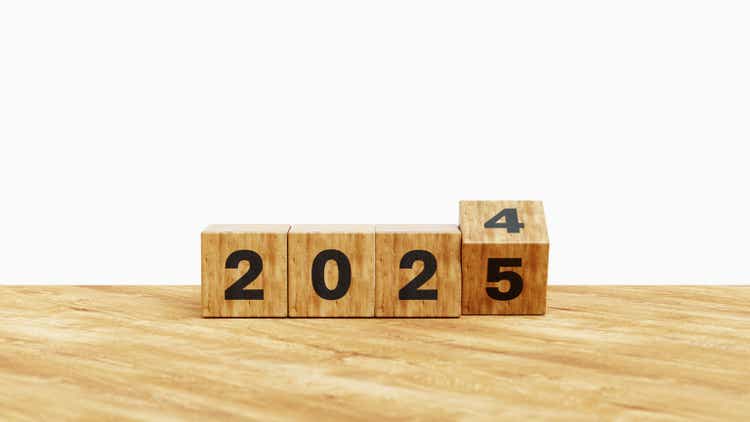 Wooden cube flips 2024 to 2025. Starting New year. New year , new life. Business targets, innovation, investment, planning, goals strategy concept