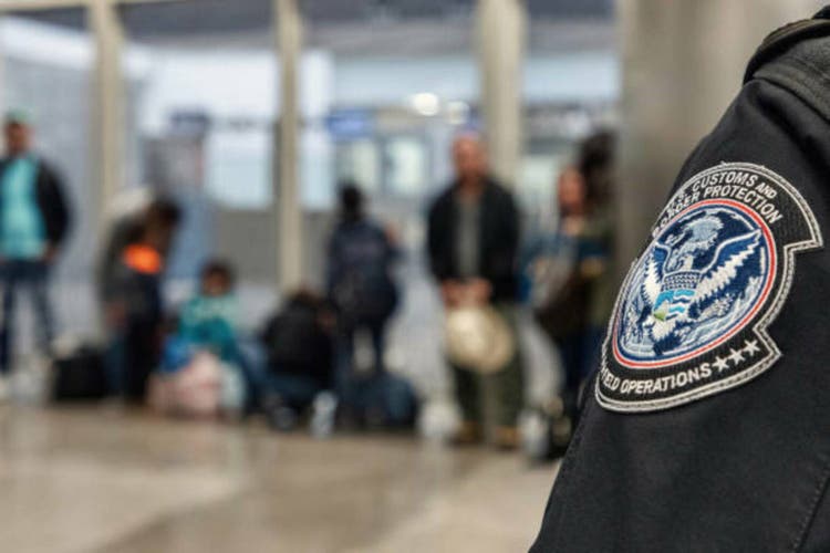 San Diego, California, USA - Nov 23 2018: Inadmissible aliens being processed by CBP officers at the San Ysidro Port of Entry - passport checkpoint