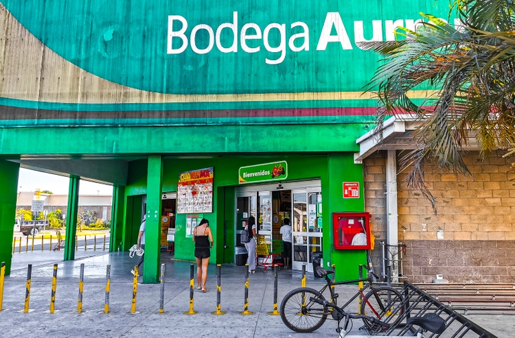 Street parking lot and supermarket in Playa del Carmen Mexico.