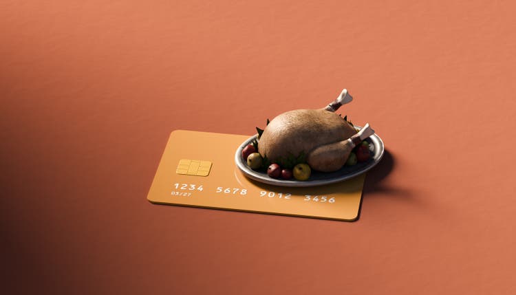 Thanksgiving turkey on top of oversized credit card