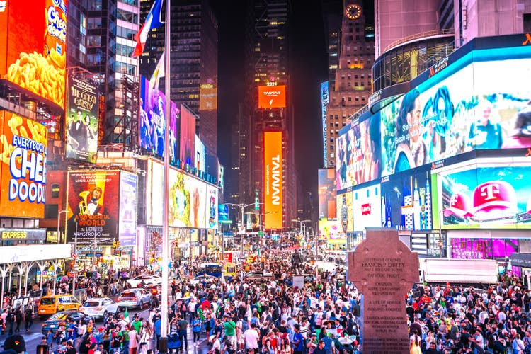 Times Square in New York City evening view. Mexico independence day celebration.