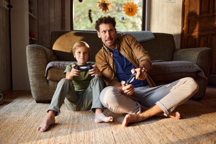 Playing video games at home!