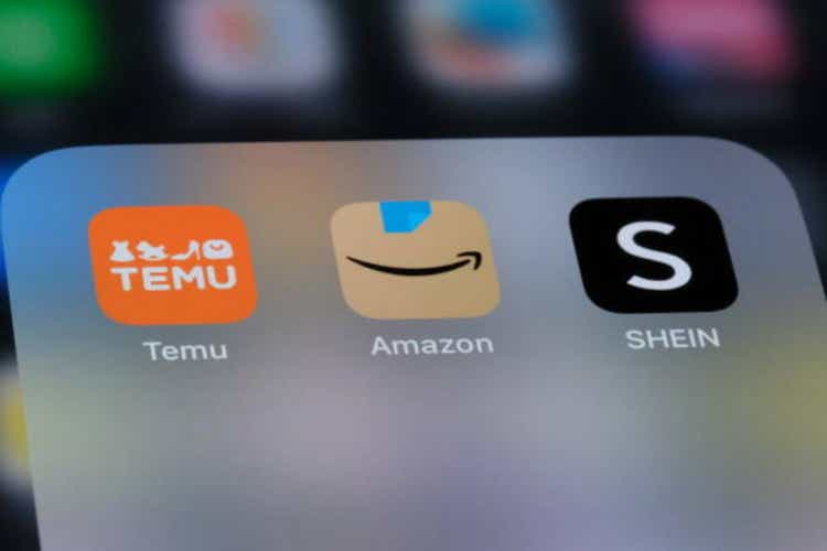 Amazon, Temu, Shein app icon on screen. Assorted online shopping companies