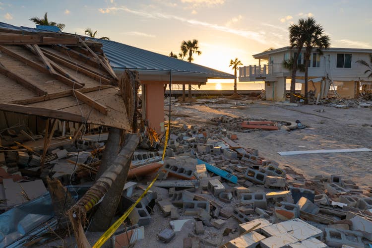 Destroyed house on ocean shore. Hurricane Milton consequences in Manasota Key, Florida. Storm surge severe damage.