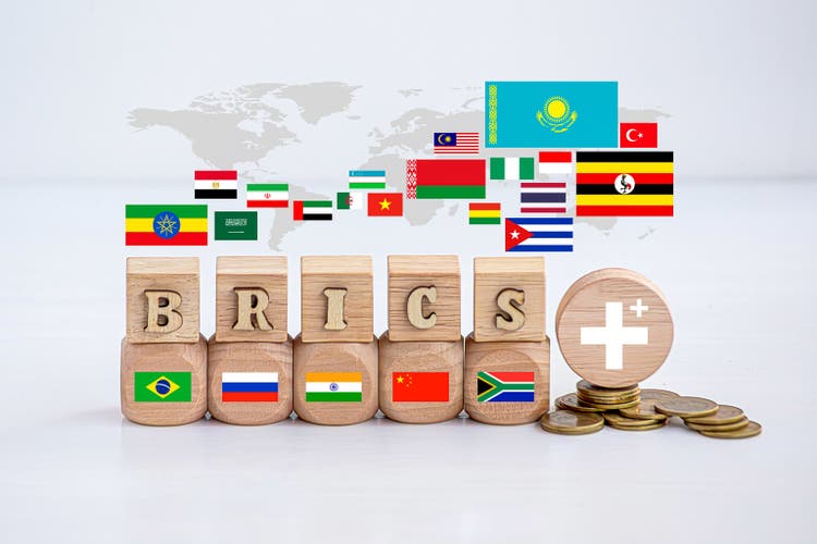 BRICS promotes the use of local currencies in international transactions to reduce reliance on the dollar.