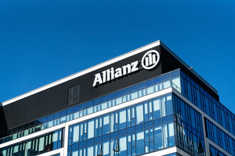 Allianz logo on Allianz Insurance Warsaw building facade, blue sky background, editorial image