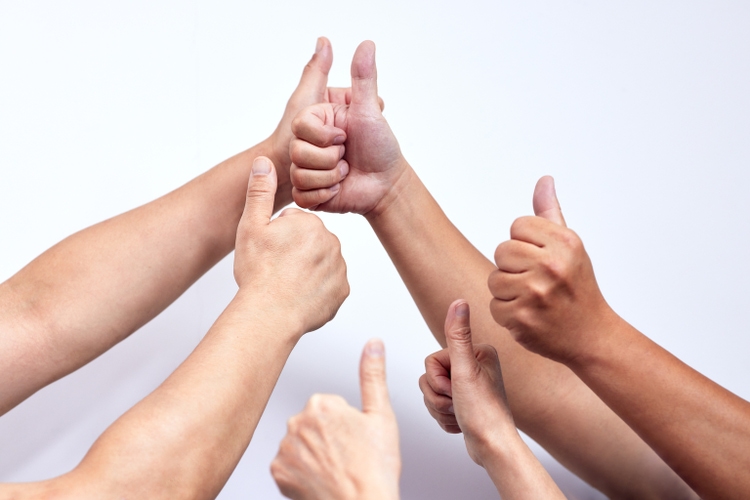 Asians group giving the thumbs up