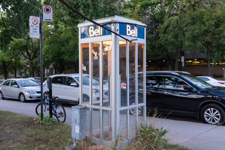 Bell Canada public pay phone booth in Montreal. Montreal, Quebec, Canada.