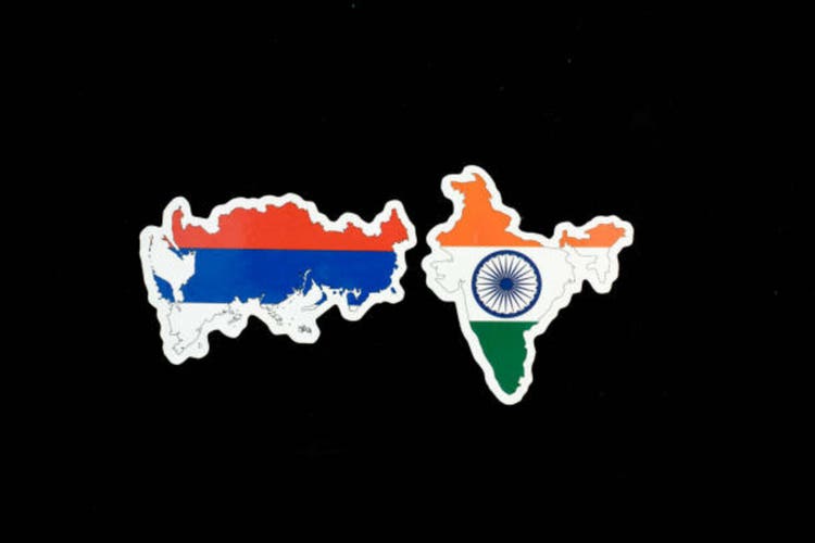 Russia and India map flags on black background