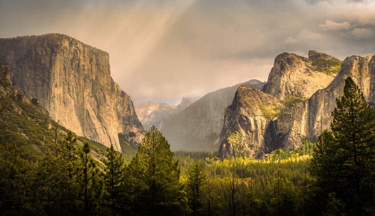View of mountain peaks in Yosemite national park in California as seen from Tunnel View in fall