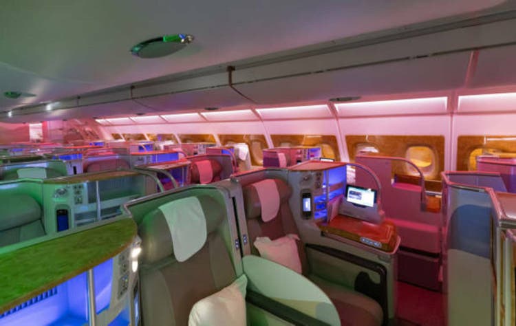 Modern airplane interiors, luxury first class and business class seats with entertainment area
