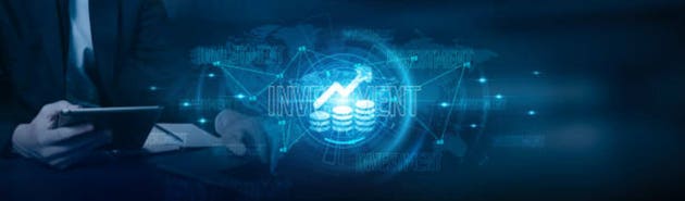 Investment. Businessman using laptop and analyzing data with investment growth on stock markets, startups, real estate, technology, and financial trends on global network.