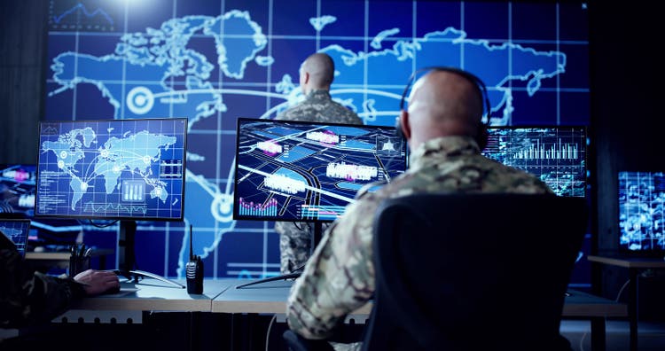 Cyber Technology Operator Monitoring Surveillance Cameras