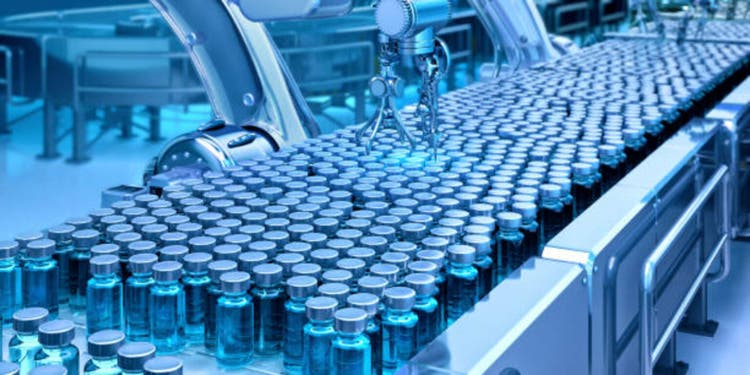 Automated pharmaceutical production line. Robot weapons, bulbs in a modern clean room.