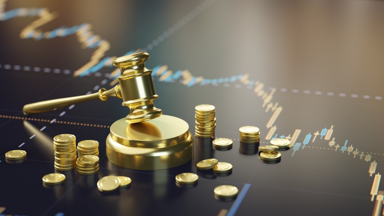 Gold Coins and Gavel on Financial Chart Background