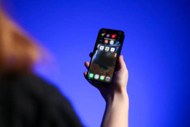 Woman using Artificial Intelligence assistant on the smartphone - DeepSeek, Chat GPT, Google Gemini