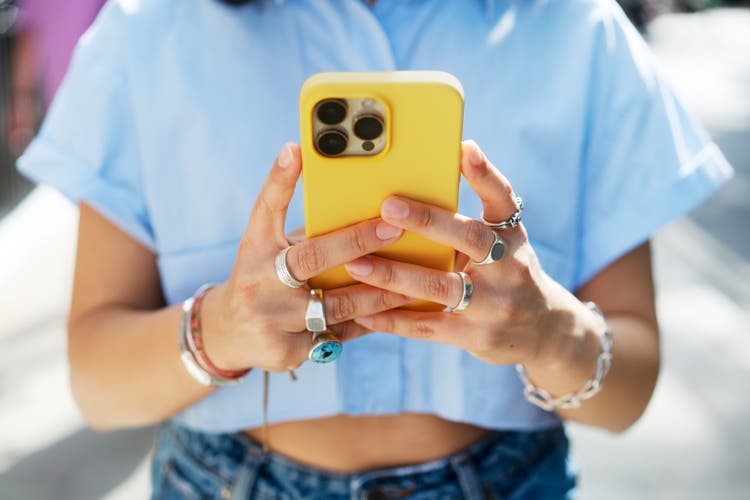 Close up of woman using smart phone