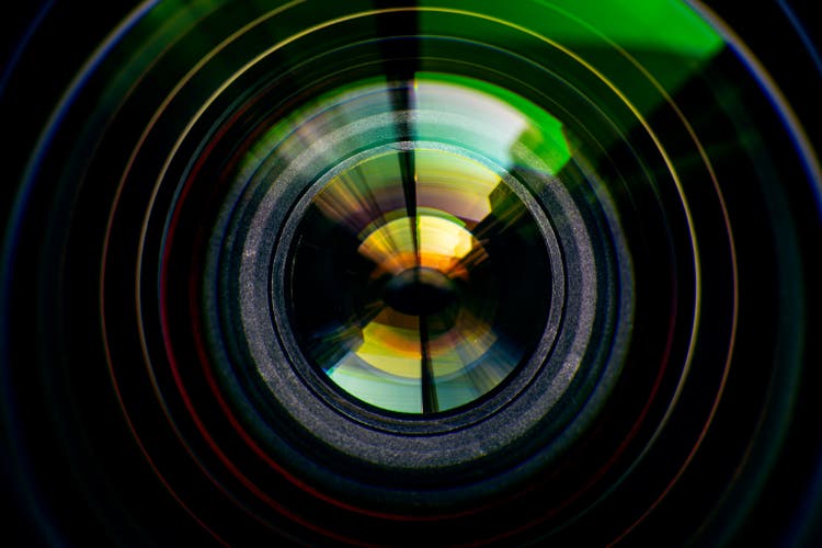 Macro camera lens,Close-up camera lens,Photo Camera or Video lens close-up on black background, objective, concept of photographer camera man job, looking for a photographer,