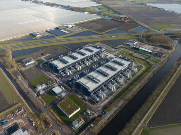 Data center, super computer, quantum computing, storage clouds space and internet infrastructure in the Netherlands, an aerial drone video.