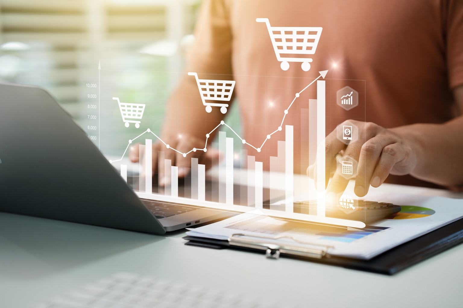 Businessman analyzing sales data, financial growth graph chart report and Using Calculator To Sum Up Shopping Cart Costs And Profits Growing In Total Sales For Online Store. Financial accounting.