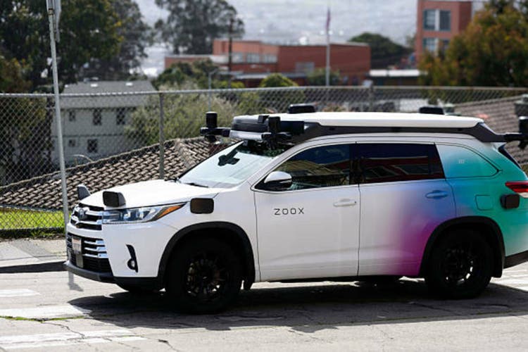 Amazon Zoox Toyota Highlander SUV equipped with self-driving technology. Front, side view