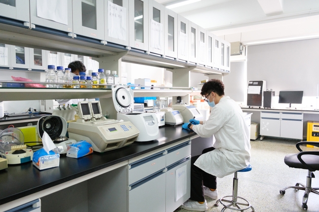 Asian people doing medical research in the laboratory