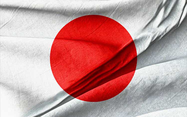Waved Textured Arafed flag of japan with a red circle on it Symbolizing National Identity and Unity