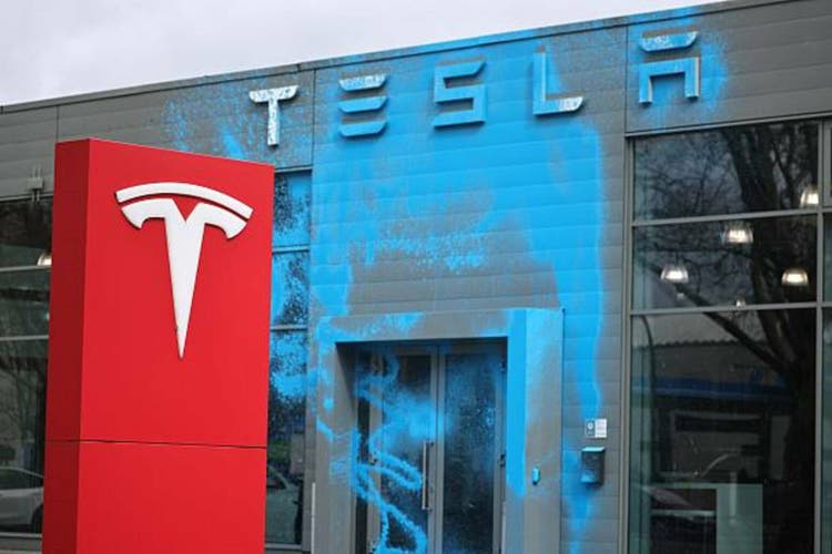 Activists Vandalize Tesla Dealership As Tesla Protests Continue