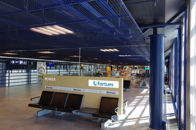 Oulu Airport interior seats and Fortum power plug socket outlet