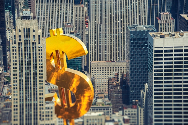 Giant golden US currency in city