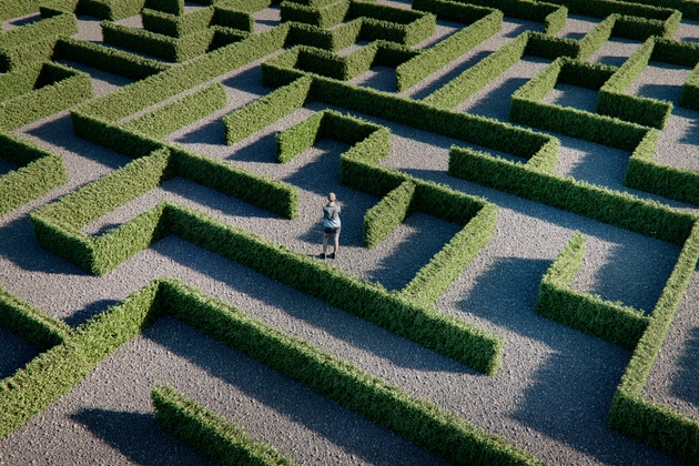 Woman standing in maze