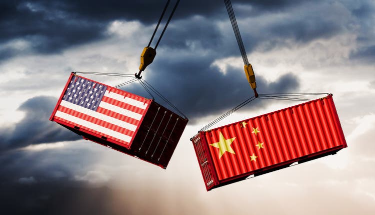 U.S.–China Trade Clash: Flag-Colored Shipping Containers Suspended for Impact Under Moody Sky