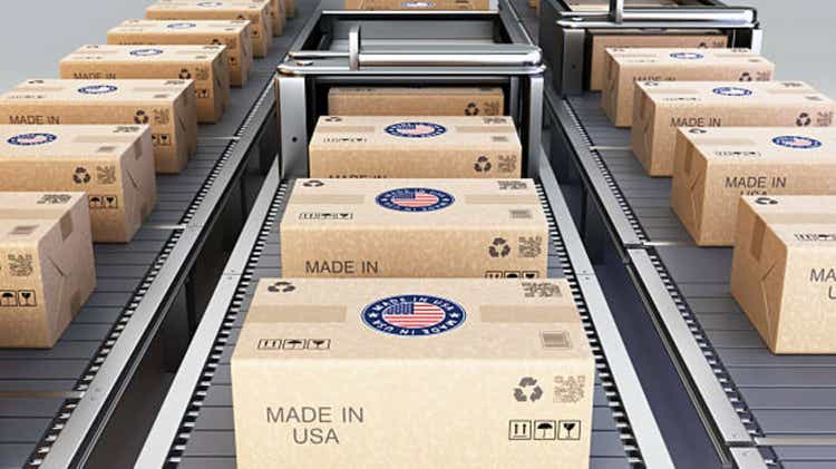 Distinctive charging boxes with symbols made in the United States of America stacked in a warehouse for distribution and delivery. 3D clarification