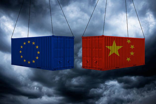Two cargo shipping containers, red Chinese flag and blue European Union flag, EU vs China, production market, industry and business rivalry, fight, trade war simple abstract concept