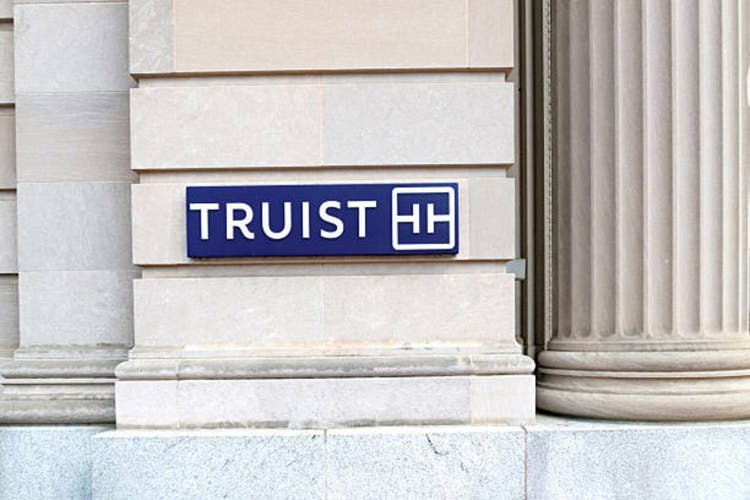 ruist Bank emblem on a column of the building.