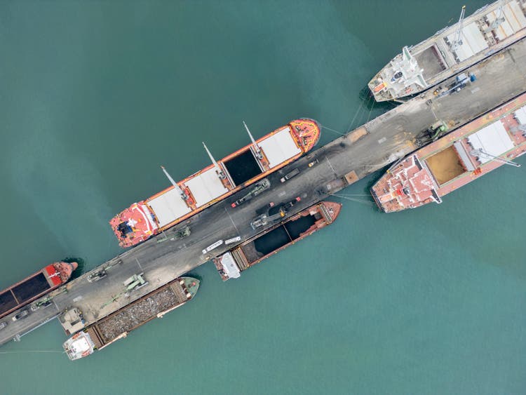 Aerial view of bulk carrier loading from truck