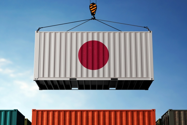 Japan trade cargo container hanging against clouds background