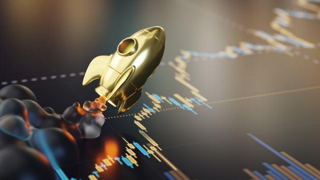 Golden Rocket and Graph Representing Growth and Financial Success