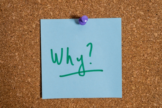 Question mark why written on sticky note asking for reason