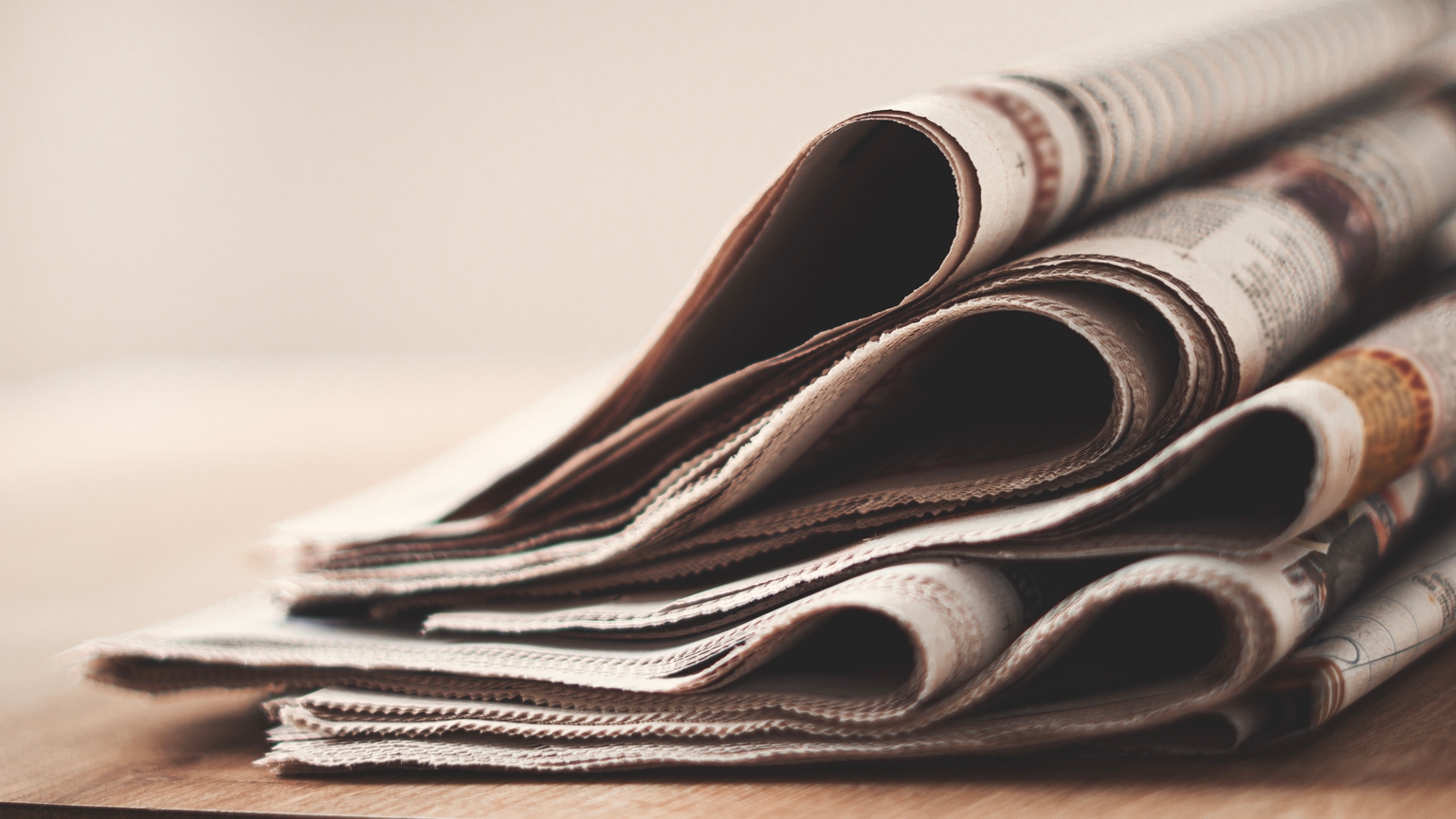 Different newspapers on the table