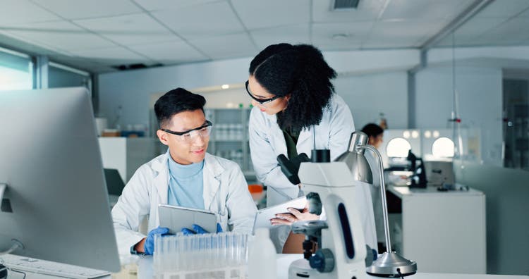 Lab, science and people on tablet for meeting with medical research, discussion and teamwork. Healthcare, biotechnology and man and woman with equipment for sample, experiment and cure for vaccine